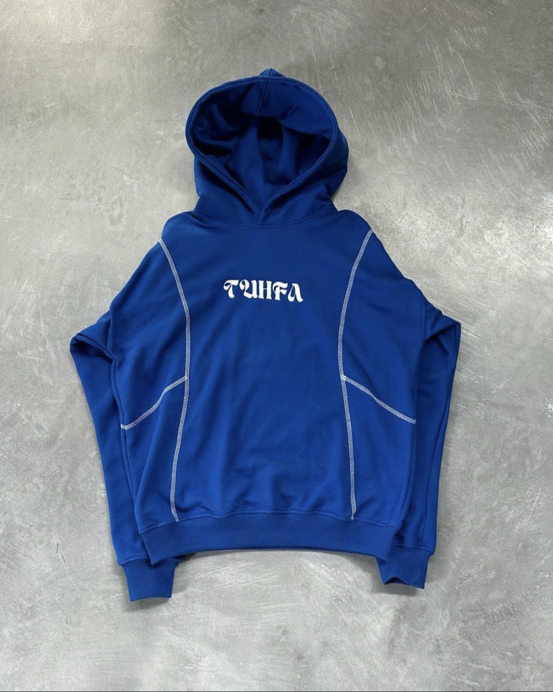 Tuhfa's blue hoodie